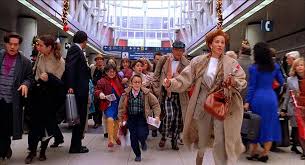 A single frame from Home Alone.  The McAllister family is running through the airport, Kevin decidedly not in tow.